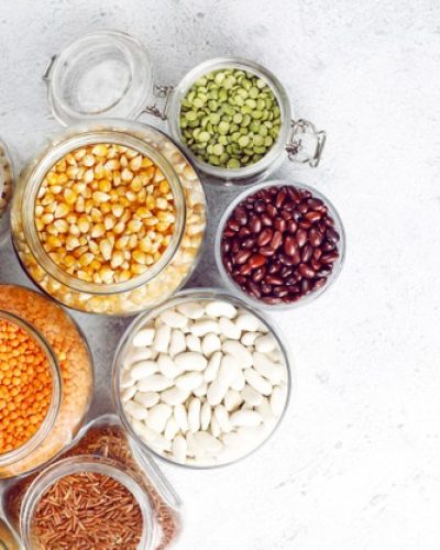 legumes-beans-assortment-different-bowls-light-stone-top-view-healthy-vegan-protein-food_114579-13629